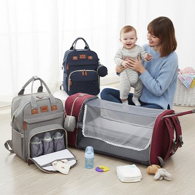 Trois sac à langer pliable gris bleu rouge