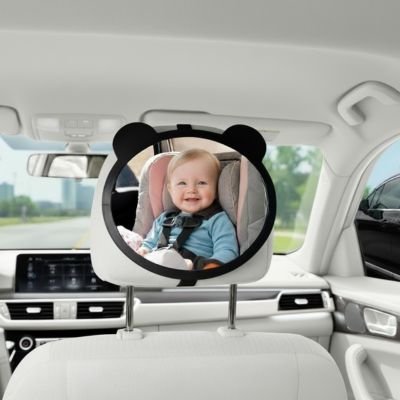 Reflet bébé en vêtement bleu dans miroir voiture bébé