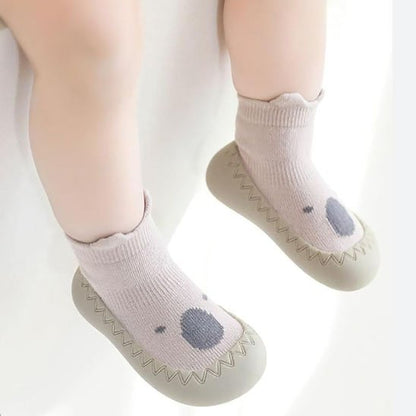 Bébé assise porte chaussure bebe vert collant blanc