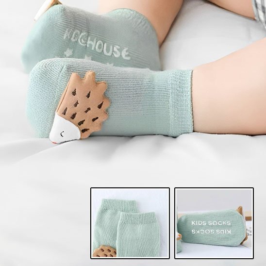 bébé porte chaussette bébé vert poisson