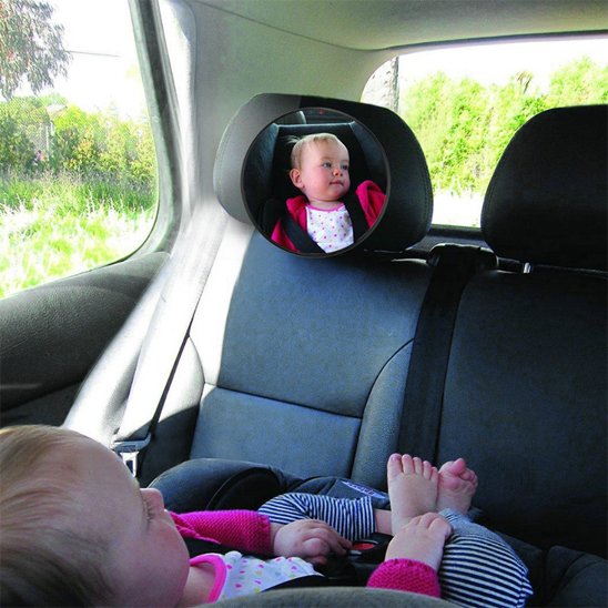 Bébé regarde son reflet dans miroir voiture bébé