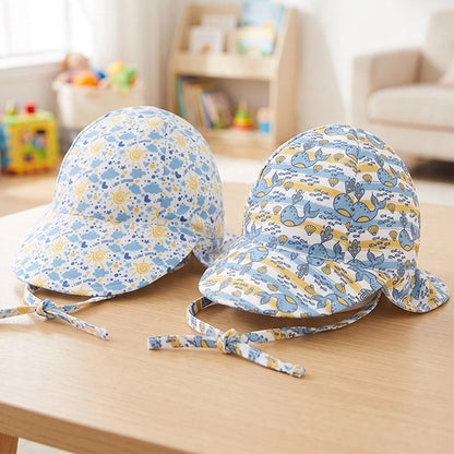 Deux casquettes bebe motifs animalier et étoiles colorés