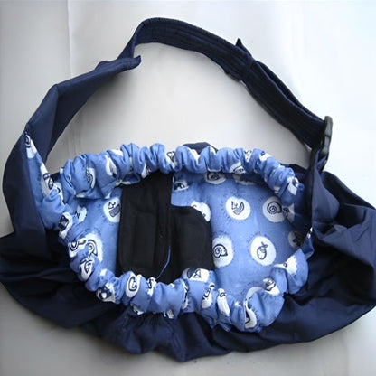 Echarpe de portage bleu fleuri posé au sol
