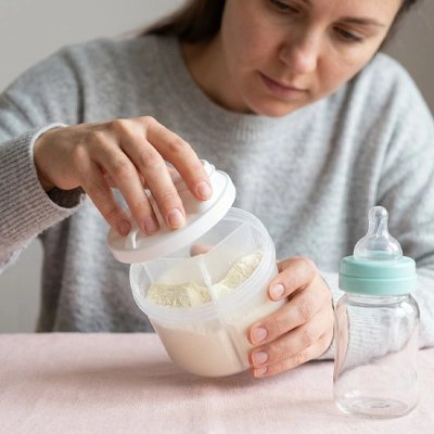 Maman ferme boite doseuse lait blanc