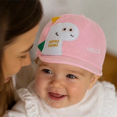 Maman porte à bébé casquette bebe rose dinosaure