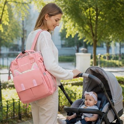 Maman porte sac  a langer a dos rose chat