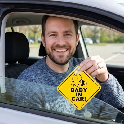 Papa présente autocollant bébé à bord​
