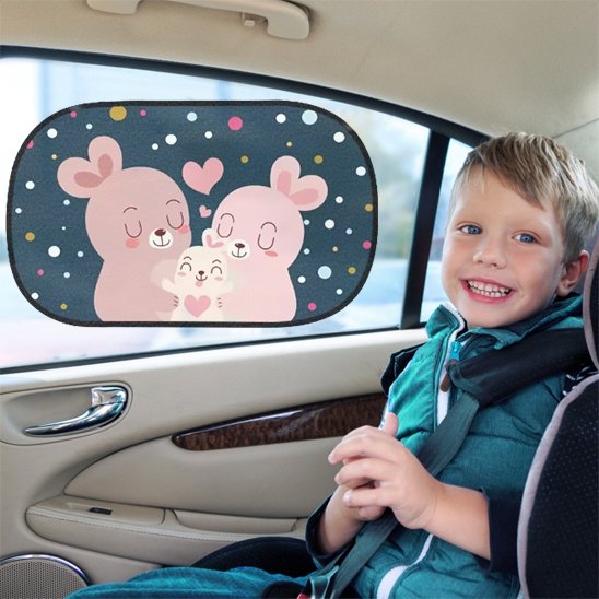 Pare soleil voiture bébé doudou sur vitre de voiture