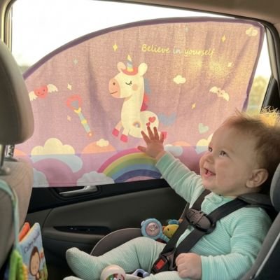 Pare soleil voiture bébé  licorne collé sur vitre voiture