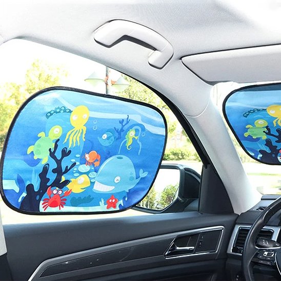 Pare soleil voiture bébé océan sur vitre de voiture